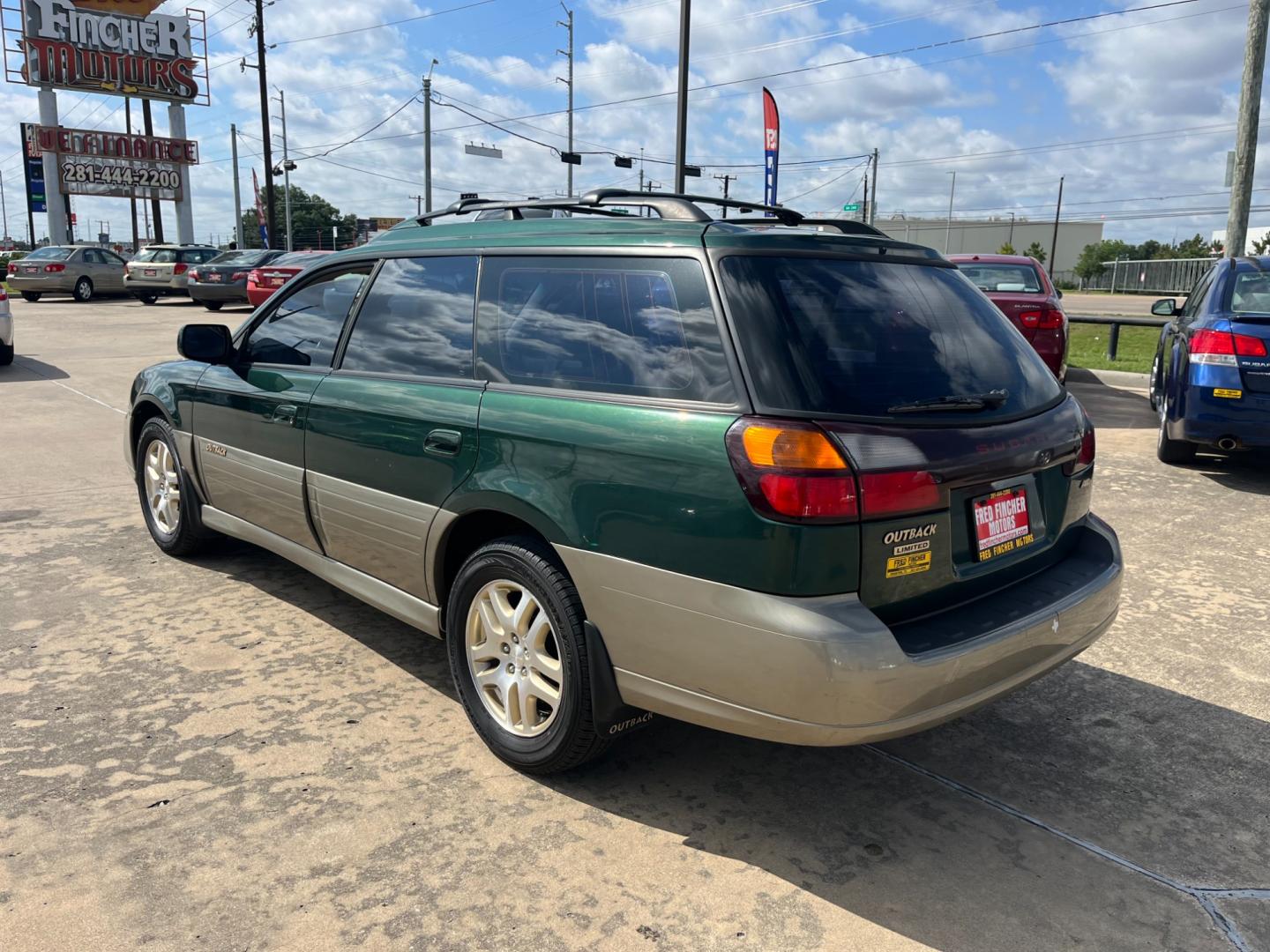 2003 green /TAN Subaru Outback Limited Wagon (4S3BH686737) with an 2.5L H4 SOHC 16V engine, 5-Speed Manual Overdrive transmission, located at 14700 Tomball Parkway 249, Houston, TX, 77086, (281) 444-2200, 29.928619, -95.504074 - Photo#4